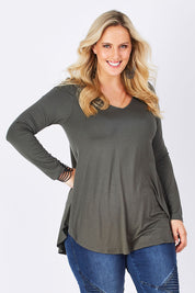 Model Jess wearing size 14 of the Long Sleeve Softly Swinging Bamboo Tee in colour Combat (Black), from the front, showing the whole outfit