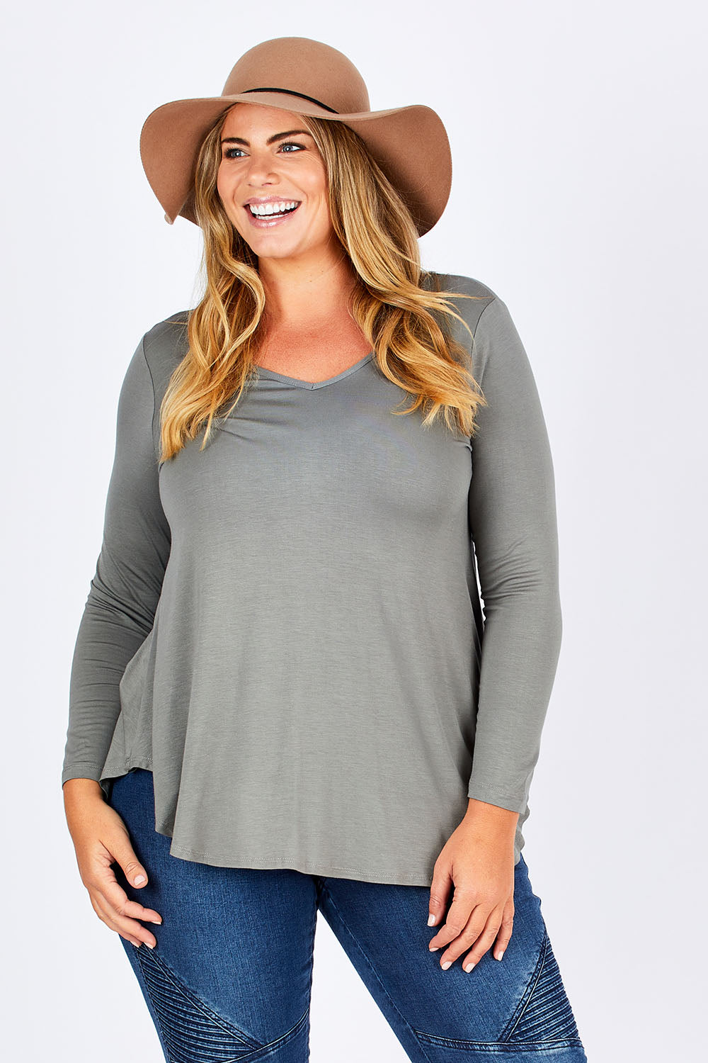 Model Fiona wearing size 16 of the Long Sleeve Softly Swinging Bamboo Tee in colour Fern (Green), from the front, cropped image