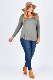 Model Fiona wearing size 16 of the Long Sleeve Softly Swinging Bamboo Tee in colour Fern (Green), from the front, showing the whole outfit