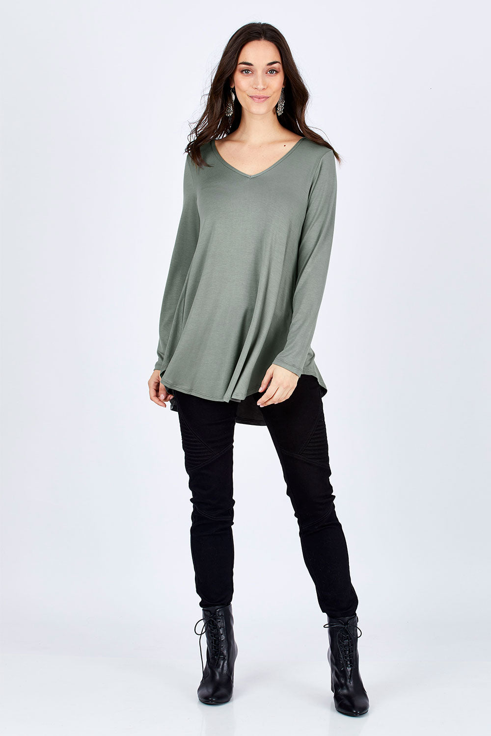 Model Georgia wearing size 10 of the Long Sleeve Softly Swinging Bamboo Tee in colour Fern (Green), from the front, showing the whole outfit