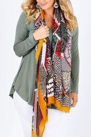Model Jess wearing size 14 of the Long Sleeve Softly Swinging Bamboo Tee in colour Fern (Green), from the front, cropped image
