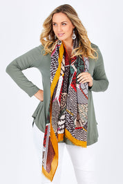 Model Jess wearing size 14 of the Long Sleeve Softly Swinging Bamboo Tee in colour Fern (Green), from the front, cropped image