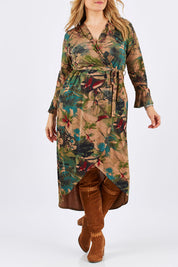 Model Ljubenka wearing size 16 of the Cloud Dancer Dress in colour Rust, from the front, cropped image