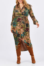 Model Ljubenka wearing size 16 of the Cloud Dancer Dress in colour Rust, from the front, cropped image
