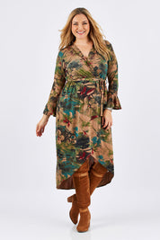 Model Ljubenka wearing size 16 of the Cloud Dancer Dress in colour Rust, from the front, showing the whole outfit