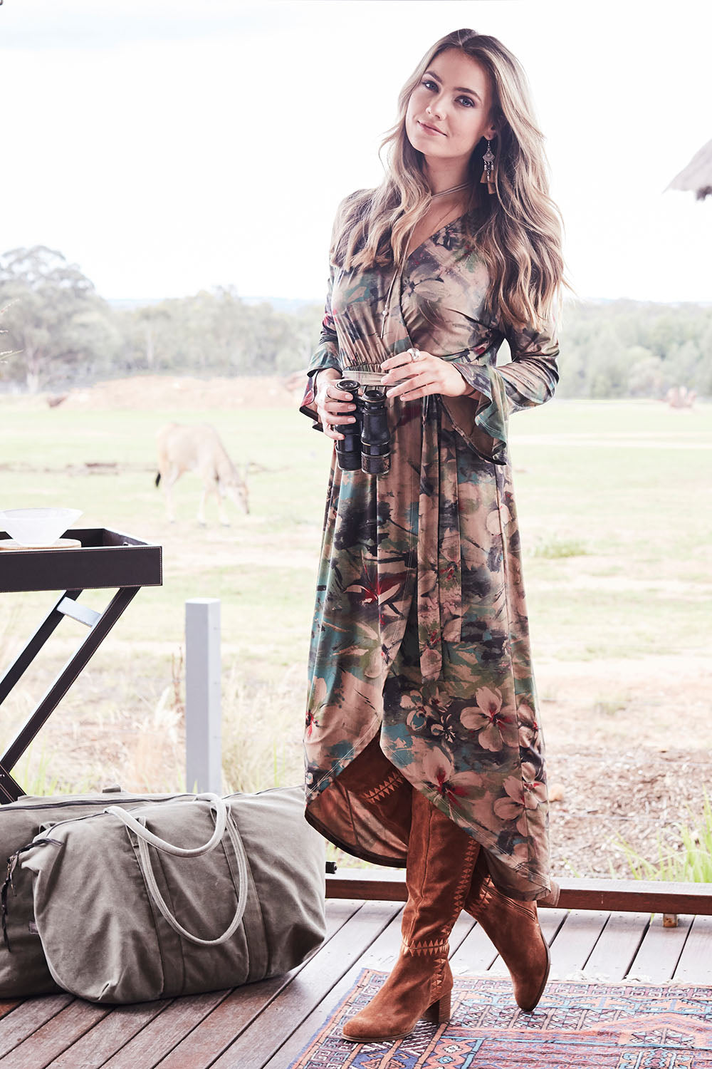 Model Marnee wearing size 10 of the Cloud Dancer Dress in colour Rust, from the front, showing the whole outfit