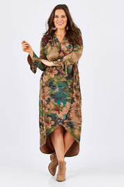 Model Tia wearing size 14 of the Cloud Dancer Dress in colour Rust, from the front, showing the whole outfit