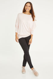 Model Cara wearing size 10 of the Wild Plains Stitched Jeggings in colour Black (Black), from the front, showing the whole outfit