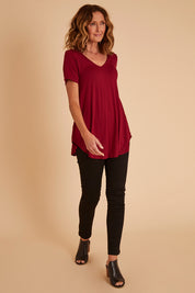 Model Emma wearing size 10 of the Wild Plains Stitched Jeggings in colour Black (Black), from the front, showing the whole outfit