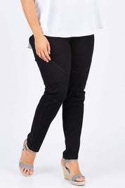 Model Mae wearing size 18 of the Wild Plains Stitched Jeggings in colour Black (Black), from the front, cropped image