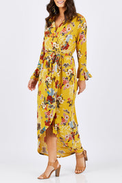 Model Georgia wearing size 10 of the Spring Blossom Dress in colour Dijon, from the front, cropped image