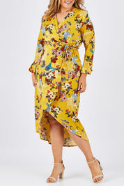 Model Ljubenka wearing size 18 of the Spring Blossom Dress in colour Dijon, from the front, cropped image