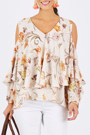 Model Georgia wearing size 10 of the Flouncing Around Blouse in colour Fleur (Pink), from the front, cropped image