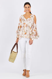 Model Georgia wearing size 10 of the Flouncing Around Blouse in colour Fleur (Pink), from the front, showing the whole outfit