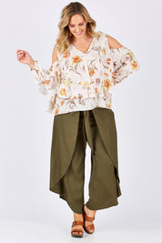 Model Jess wearing size 14 of the Flouncing Around Blouse in colour Fleur (Pink), from the front, showing the whole outfit