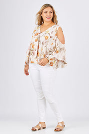 Model Ljubenka wearing size 18 of the Flouncing Around Blouse in colour Fleur (Pink), from the front, showing the whole outfit