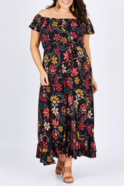 Model Mae wearing size 18 of the Dance With Me Maxi Dress in colour Black (Black), from the front, cropped image
