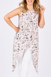 Model Jess wearing size 14 of the Flying Free Top in colour PinkFleur (Pink), from the front, cropped image
