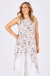 Model Jess wearing size 14 of the Flying Free Top in colour PinkFleur (Pink), from the front, cropped image