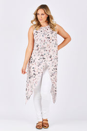 Model Jess wearing size 14 of the Flying Free Top in colour PinkFleur (Pink), from the front, showing the whole outfit