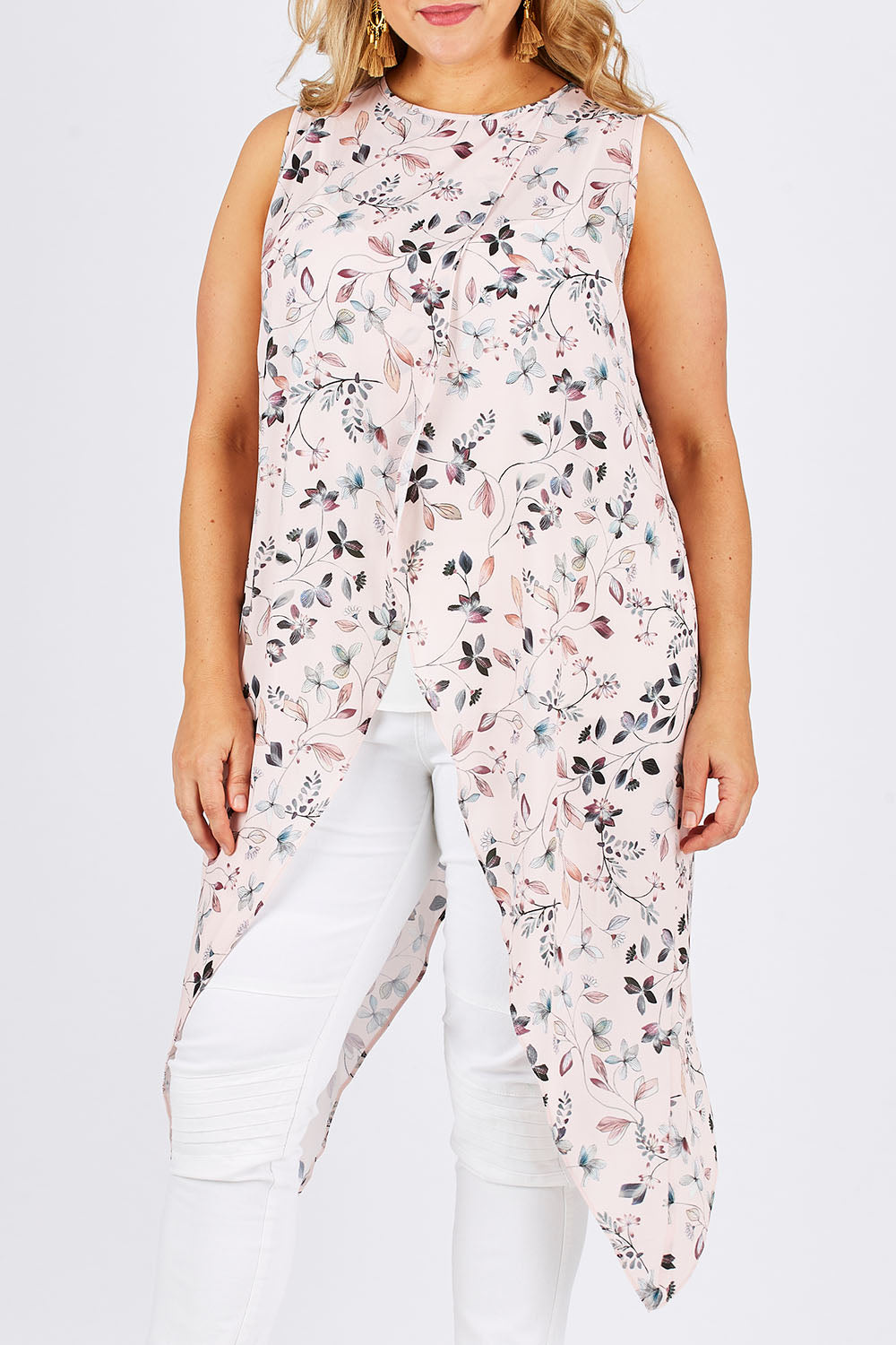 Model Ljubenka wearing size 18 of the Flying Free Top in colour PinkFleur (Pink), from the front, cropped image