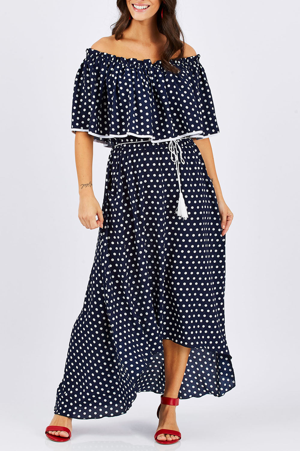 Model Georgia wearing size 10 of the Florence Maxi Dress in colour NavySpot (Blue), from the front, cropped image