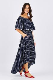 Model Georgia wearing size 10 of the Florence Maxi Dress in colour NavySpot (Blue), from the front, showing the whole outfit