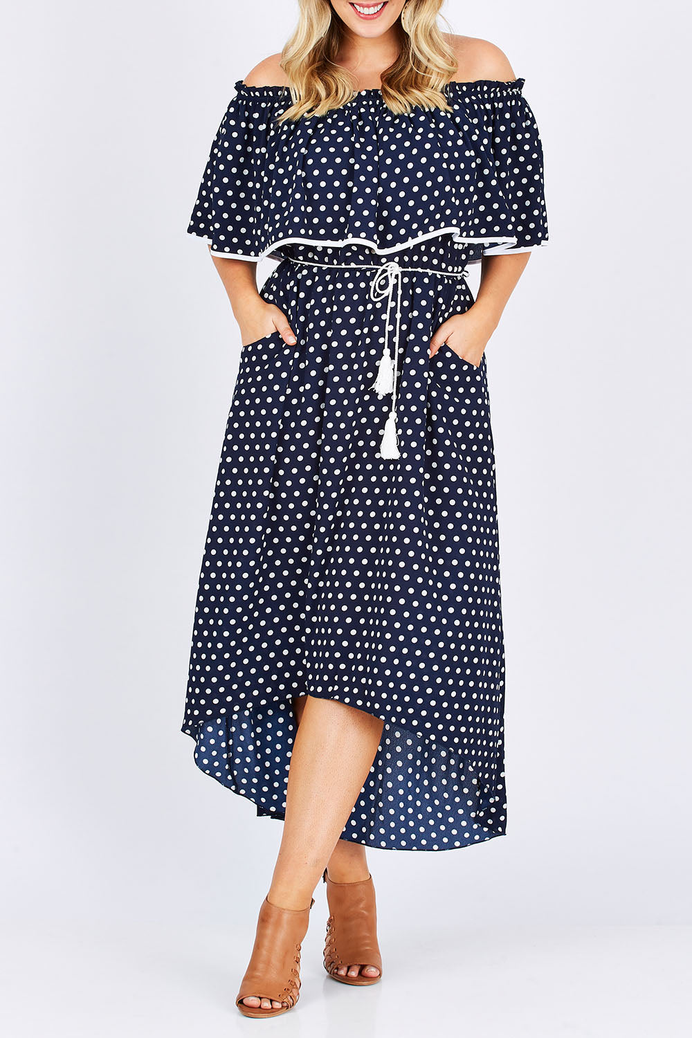 Model Jess wearing size 14 of the Florence Maxi Dress in colour NavySpot (Blue), from the front, cropped image