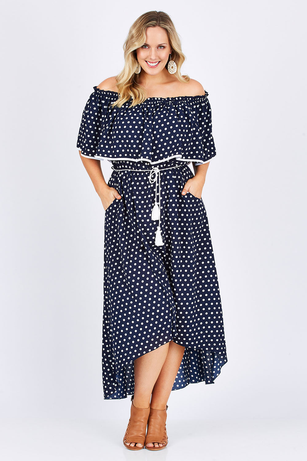 Model Jess wearing size 14 of the Florence Maxi Dress in colour NavySpot (Blue), from the front, showing the whole outfit