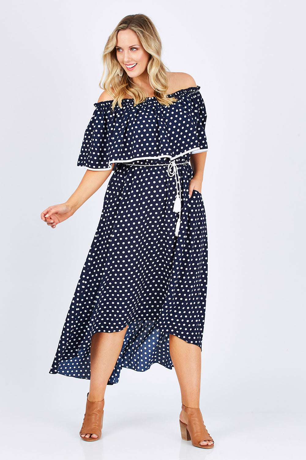 Model Jess wearing size 14 of the Florence Maxi Dress in colour NavySpot (Blue), from the front, showing the whole outfit