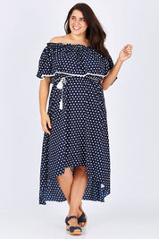 Model Mae wearing size 18 of the Florence Maxi Dress in colour NavySpot (Blue), from the front, showing the whole outfit
