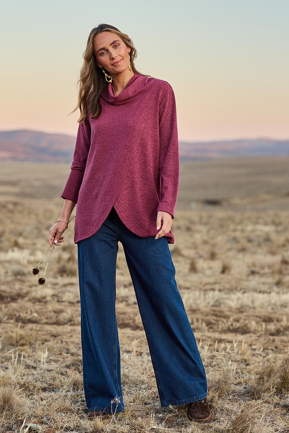 Model Tegan wearing size 10 of the Happy Me Wide Leg Jeans in colour Darkdenim (Blue), from the front, showing the whole outfit