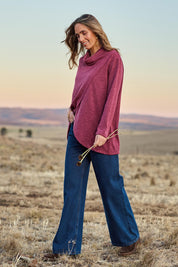 Model Tegan wearing size 10 of the Happy Me Wide Leg Jeans in colour Darkdenim (Blue), from the front, showing the whole outfit
