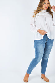 Model Fiona wearing size 16 of the You Patched Me All Up Jeans in colour PaleDenim (Blue), from the front, showing the whole outfit