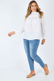Model Fiona wearing size 16 of the You Patched Me All Up Jeans in colour PaleDenim (Blue), from the front, showing the whole outfit