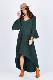 Model Georgia wearing size 10 of the Cloud Kissed Dress in colour Forest (Green), from the front, showing the whole outfit