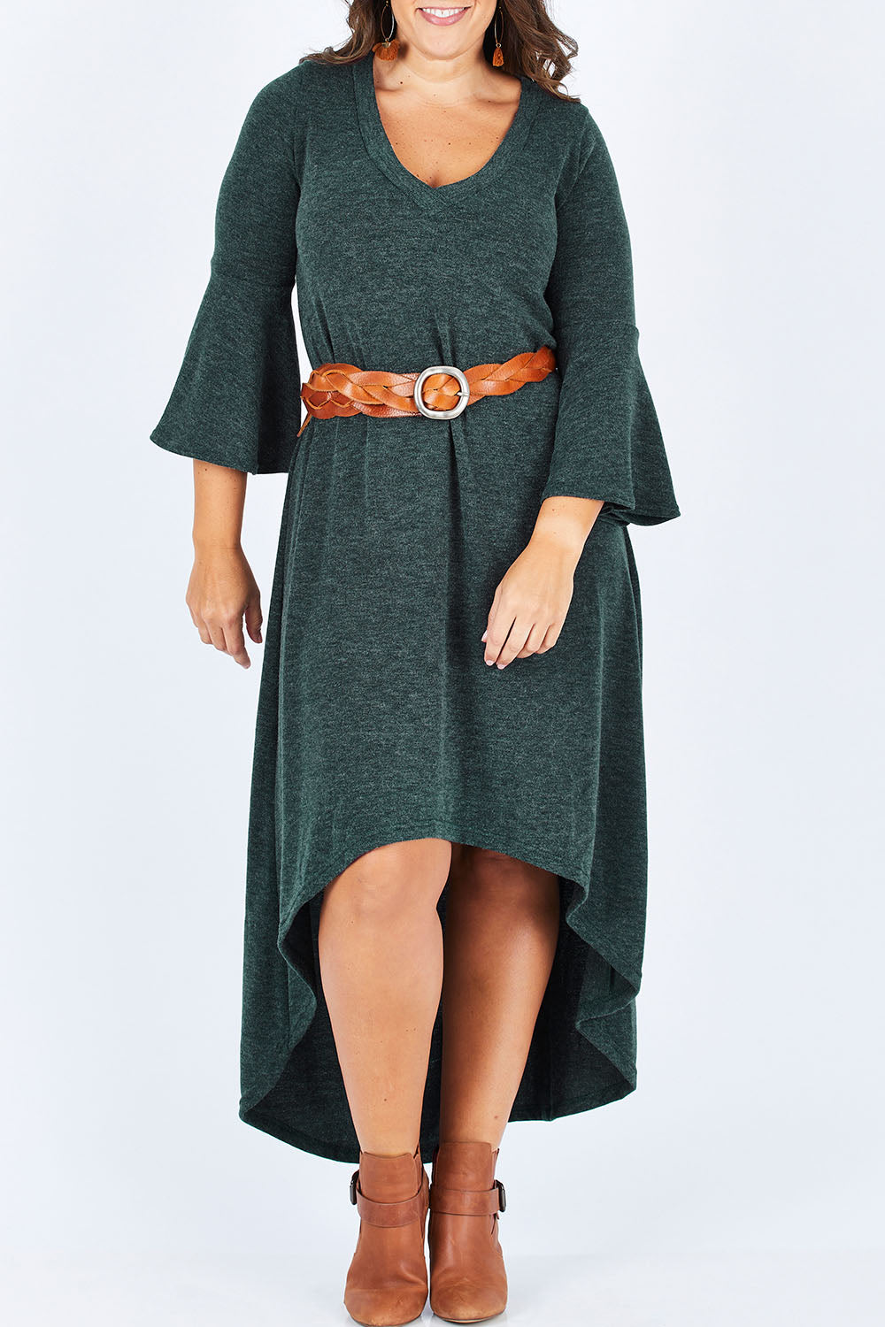 Model Stacey wearing size 12 of the Cloud Kissed Dress in colour Forest (Green), from the front, cropped image