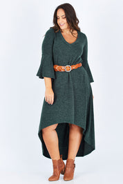 Model Stacey wearing size 12 of the Cloud Kissed Dress in colour Forest (Green), from the front, showing the whole outfit