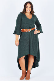 Model Stacey wearing size 12 of the Cloud Kissed Dress in colour Forest (Green), from the front, showing the whole outfit