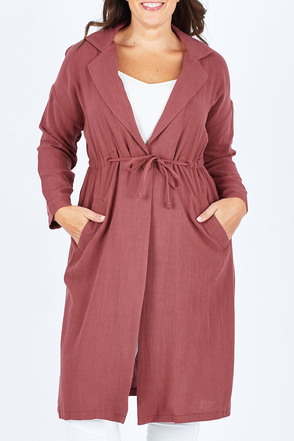 Model Stacey wearing size 12 of the Got You Covered Jacket in colour Wine (Red), from the front, cropped image