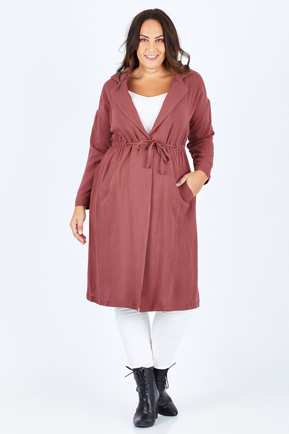 Model Stacey wearing size 12 of the Got You Covered Jacket in colour Wine (Red), from the front, showing the whole outfit