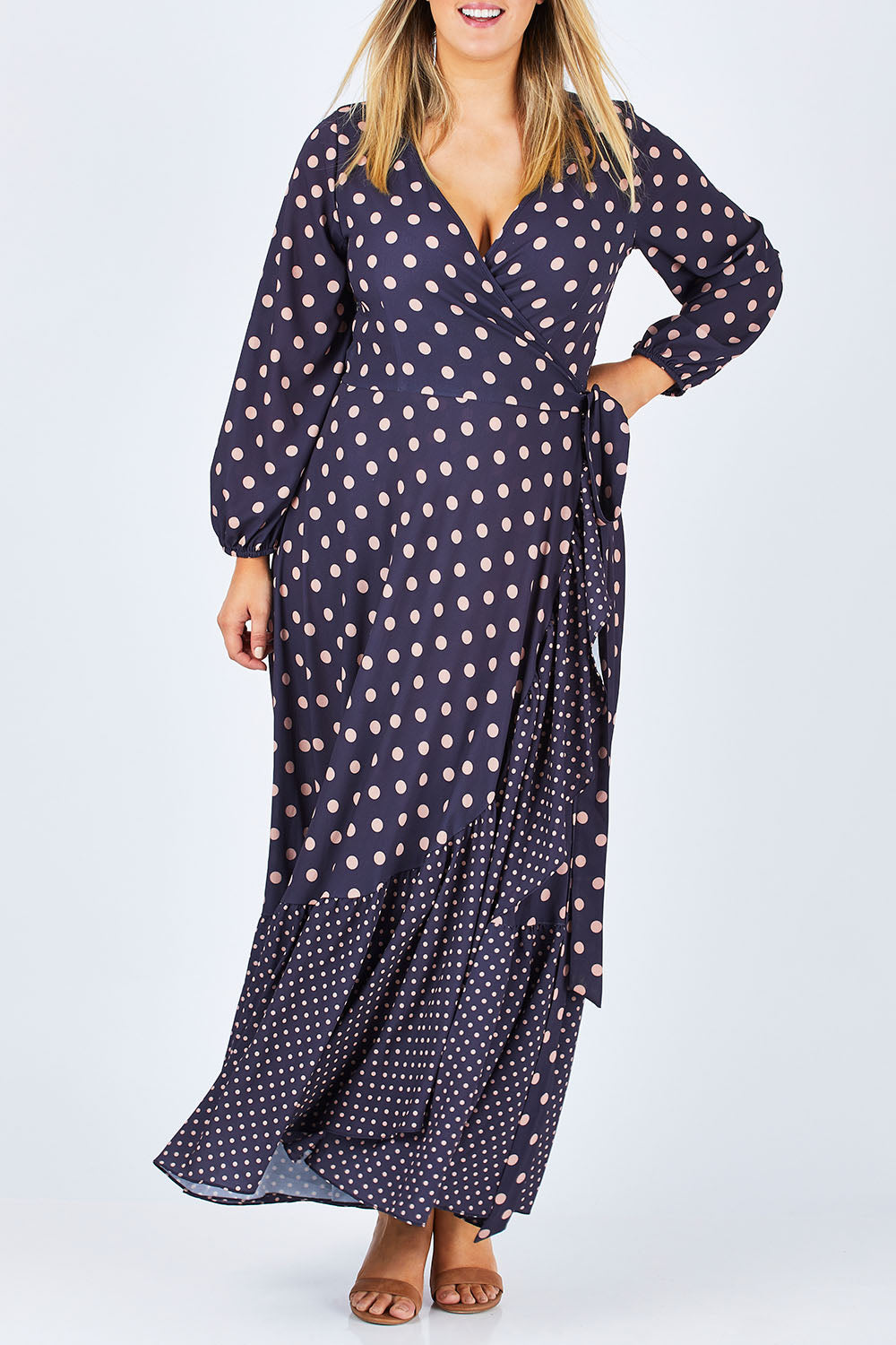 Model Jess wearing size 14 of the Spotty About You Maxi Dress in colour NavySpot (Blue), from the front, cropped image