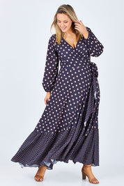 Model Jess wearing size 14 of the Spotty About You Maxi Dress in colour NavySpot (Blue), from the front, showing the whole outfit