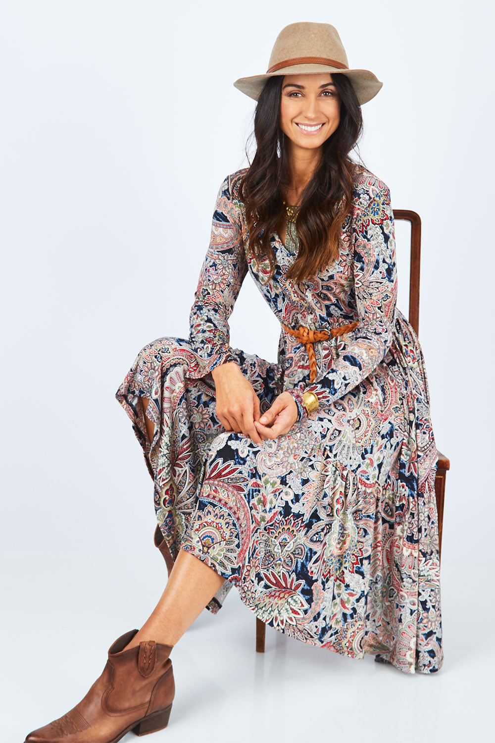 Model Gemma wearing size 10 of the Wind In My Hair Dress in colour Paisley (Red), from the front, showing the whole outfit