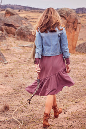 Model Marnee wearing size 10 of the Cruising With You Dress in colour Lavender (Black), from the front, showing the whole outfit