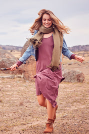 Model Marnee wearing size 10 of the Cruising With You Dress in colour Lavender (Black), from the front, showing the whole outfit