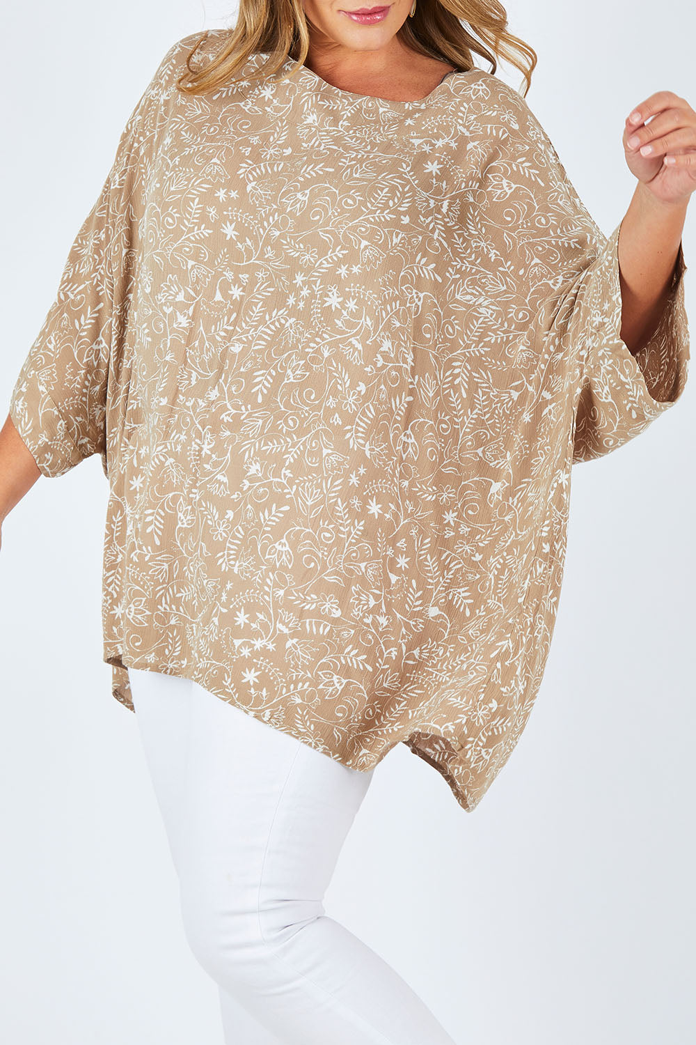 Model Fiona wearing size 16 of the On The Horizon Swing Top in colour Khaki (Green), from the front, cropped image