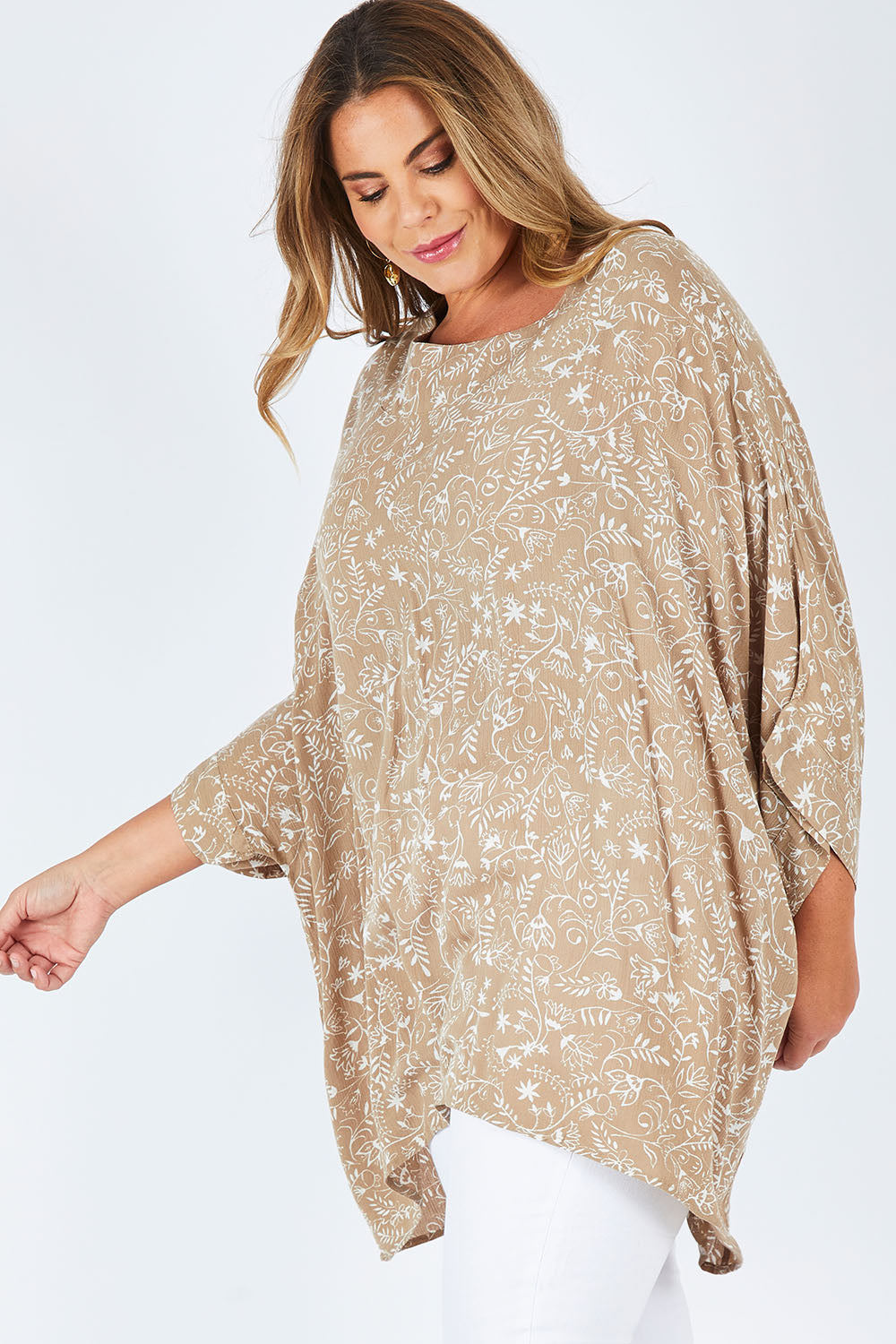 Model Fiona wearing size 16 of the On The Horizon Swing Top in colour Khaki (Green), from the front, cropped image