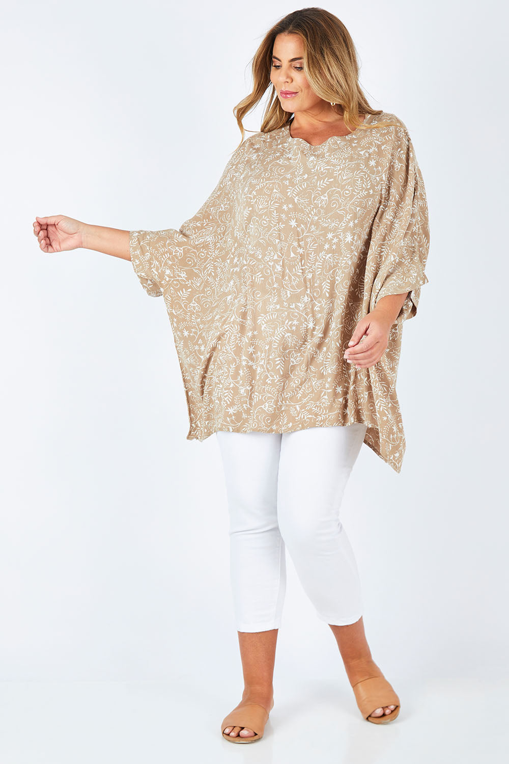 Model Fiona wearing size 16 of the On The Horizon Swing Top in colour Khaki (Green), from the front, showing the whole outfit