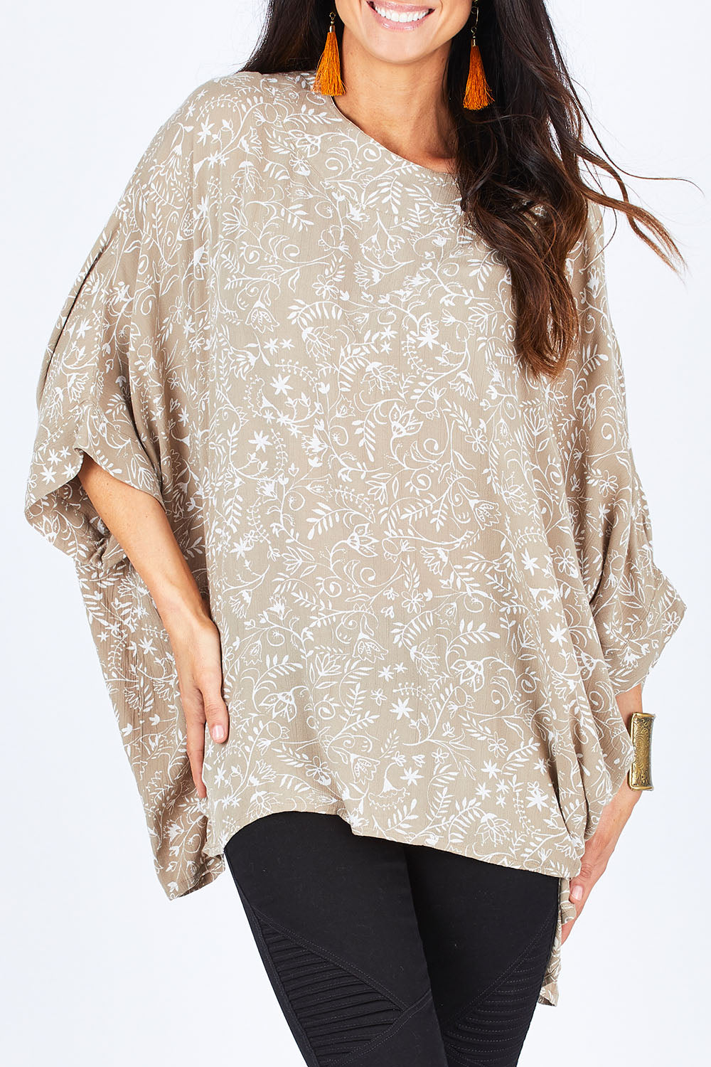 Model Gemma wearing size 10 of the On The Horizon Swing Top in colour Khaki (Green), from the front, cropped image